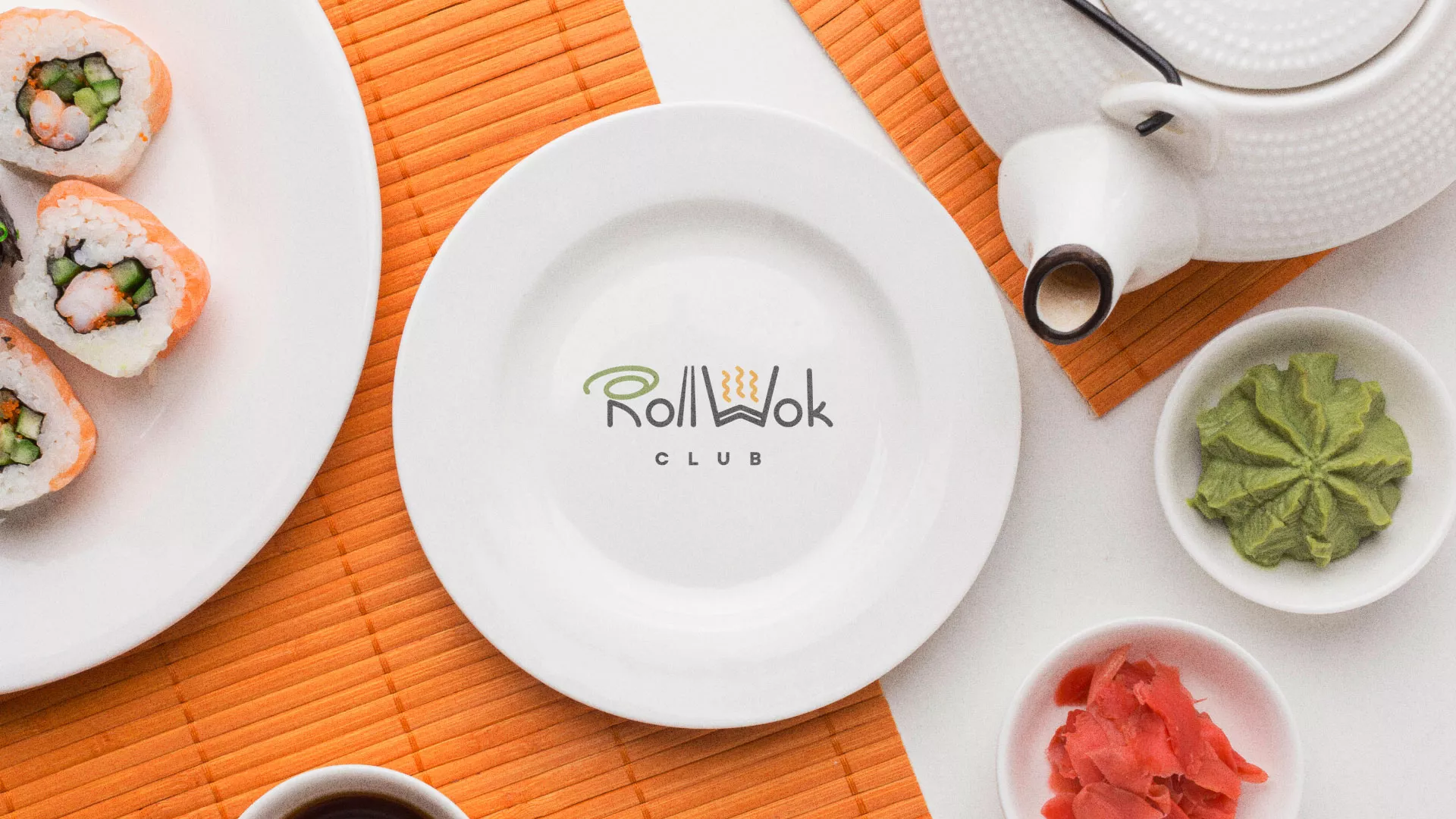 Разработка логотипа и фирменного стиля в Тырныаузе для суши-бара «Roll Wok Club» Разработка логотипа и фирменного стиля в Тырныаузе для суши-бара «Roll Wok Club»